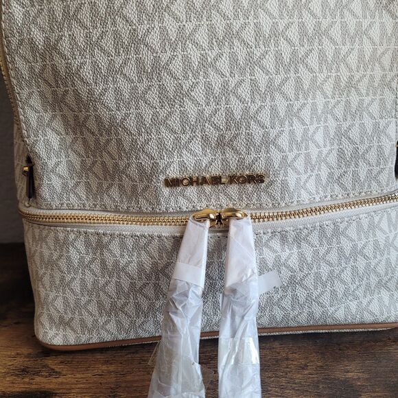 NEW Michael Kors Rhea Zip Slim Medium Backpack Vanilla Ivory Monogram Logo NWT - Picture 4 of 8